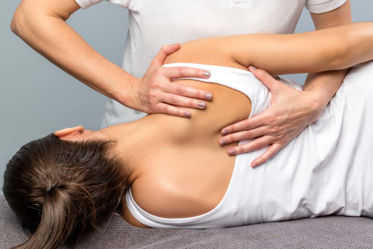 person undergoing a chiropractic adjustment