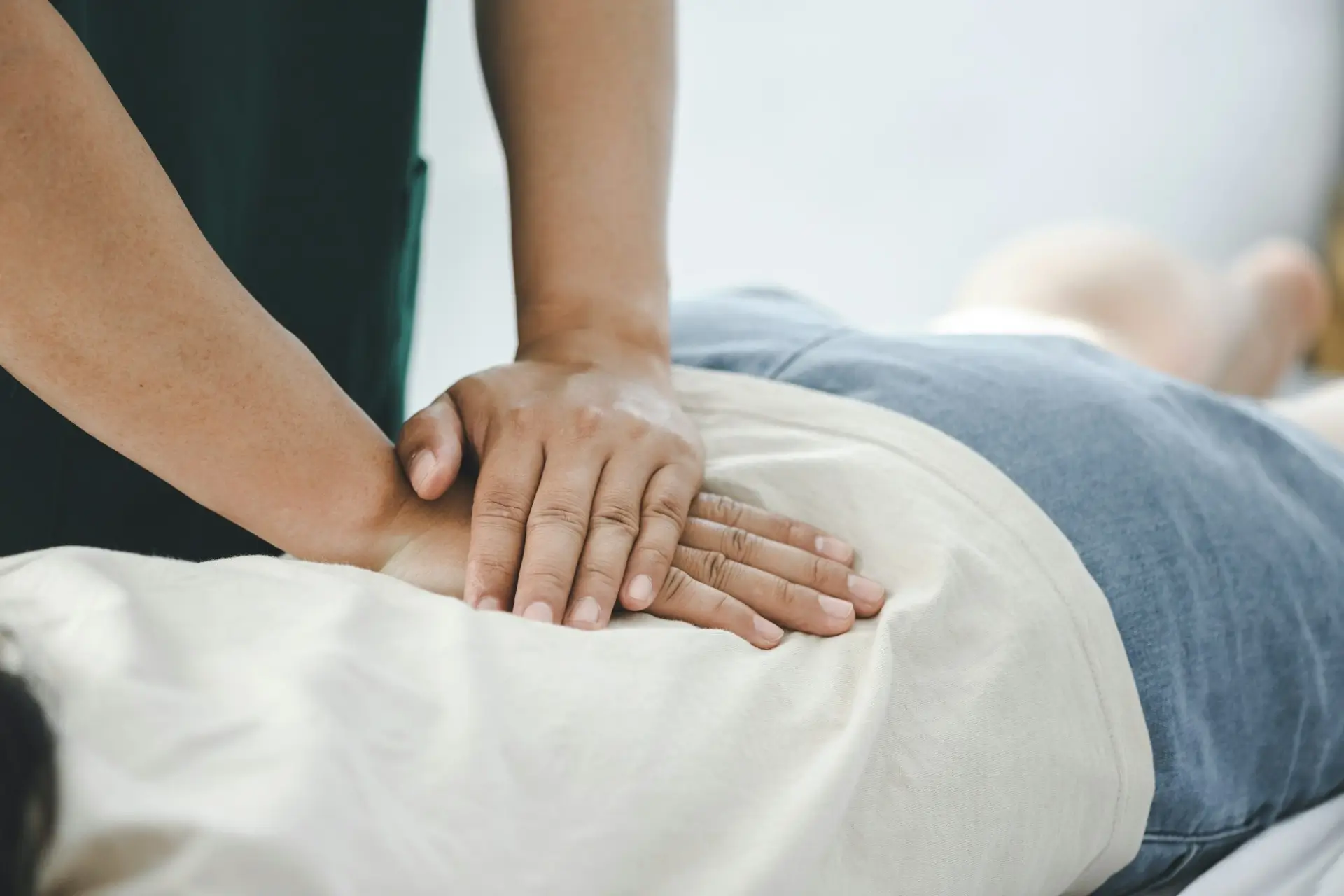 Chiropractor in Las Vegas performing spinal adjustment to help relieve back pain, neck pain, and headaches.