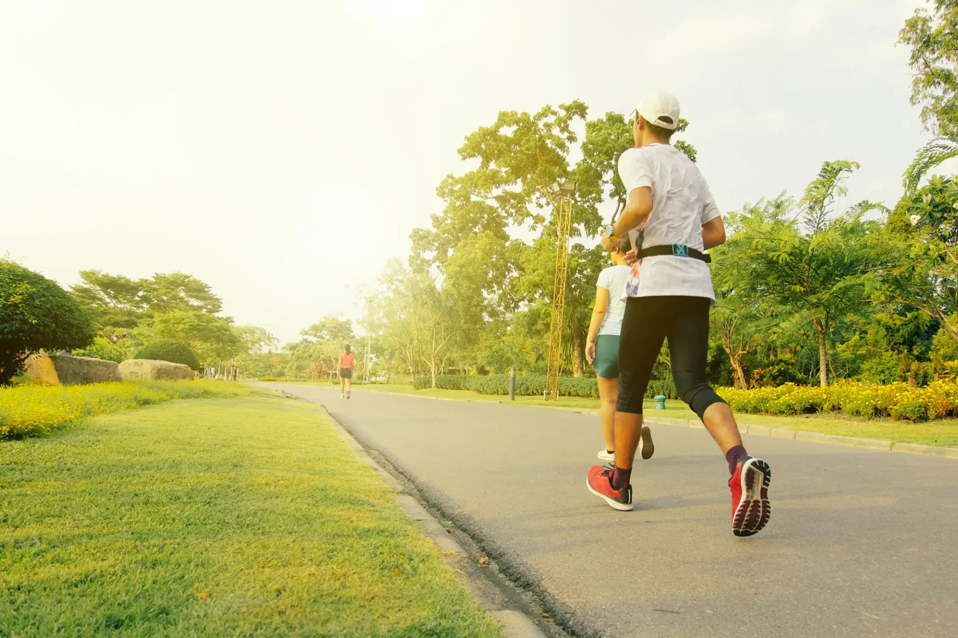 People walking outdoors for light exercise after a chiropractic adjustment in Las Vegas, supporting recovery from back pain, neck pain, and headaches.